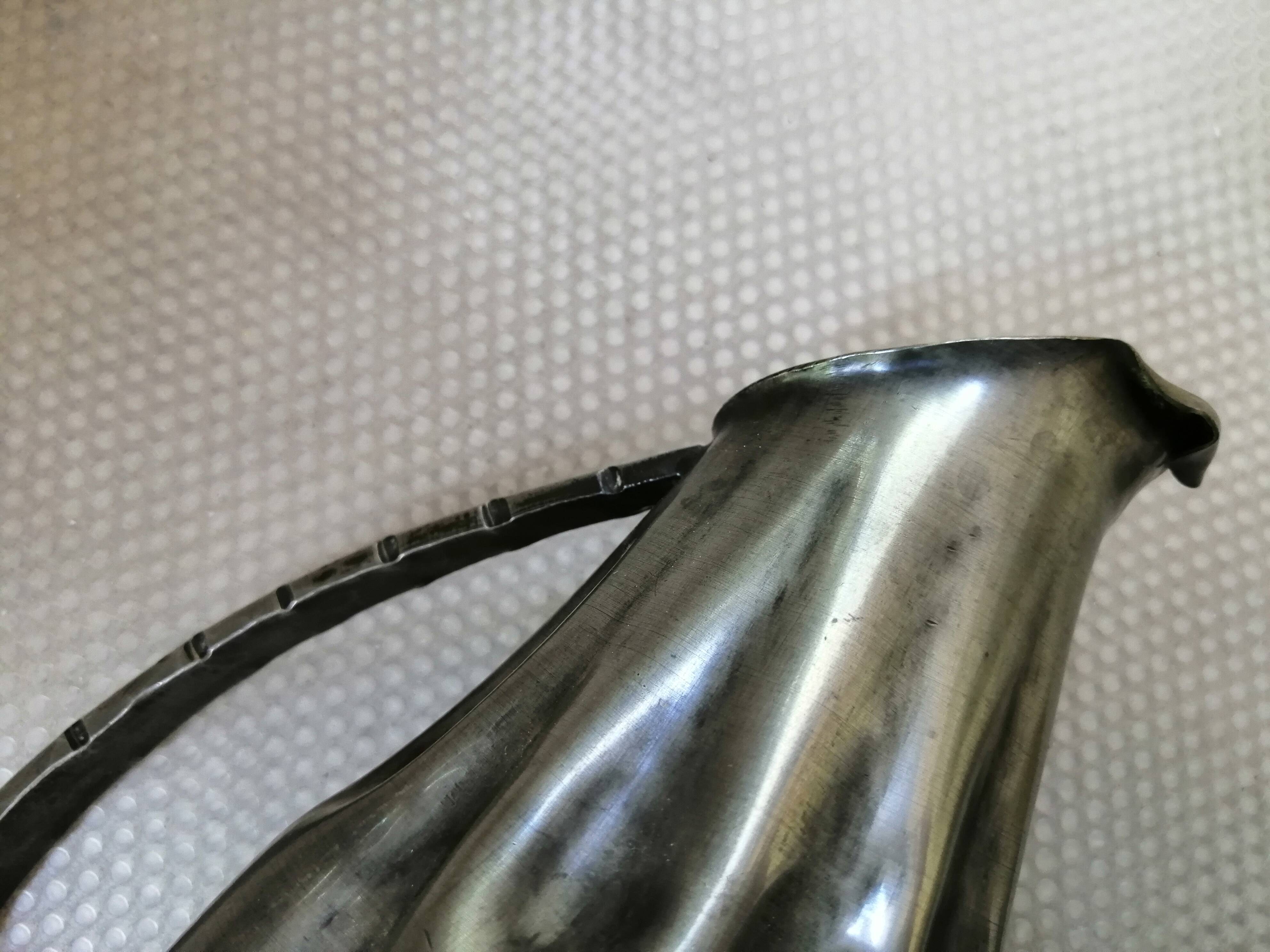 Tin pitcher signed and dated 1922