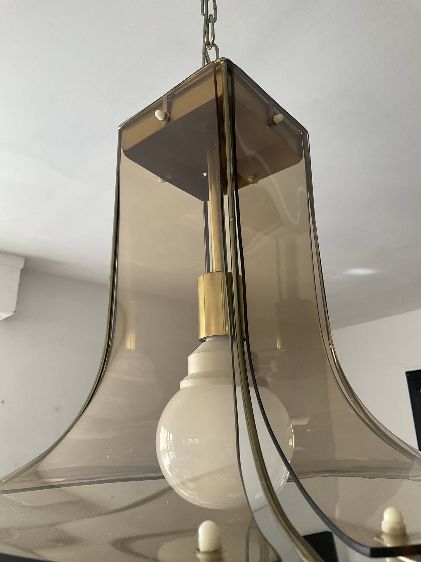 Italian suspension lamp in smoked glass and brass from the 1970s.