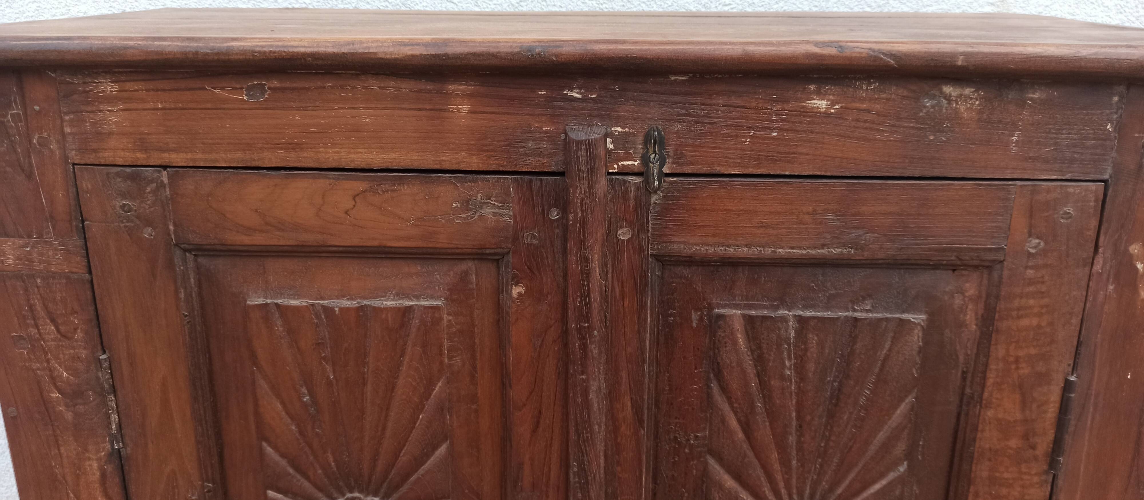 Old wooden cabinet with ceramic handles