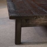 Brutalist coffee table in dark spruce with oak base