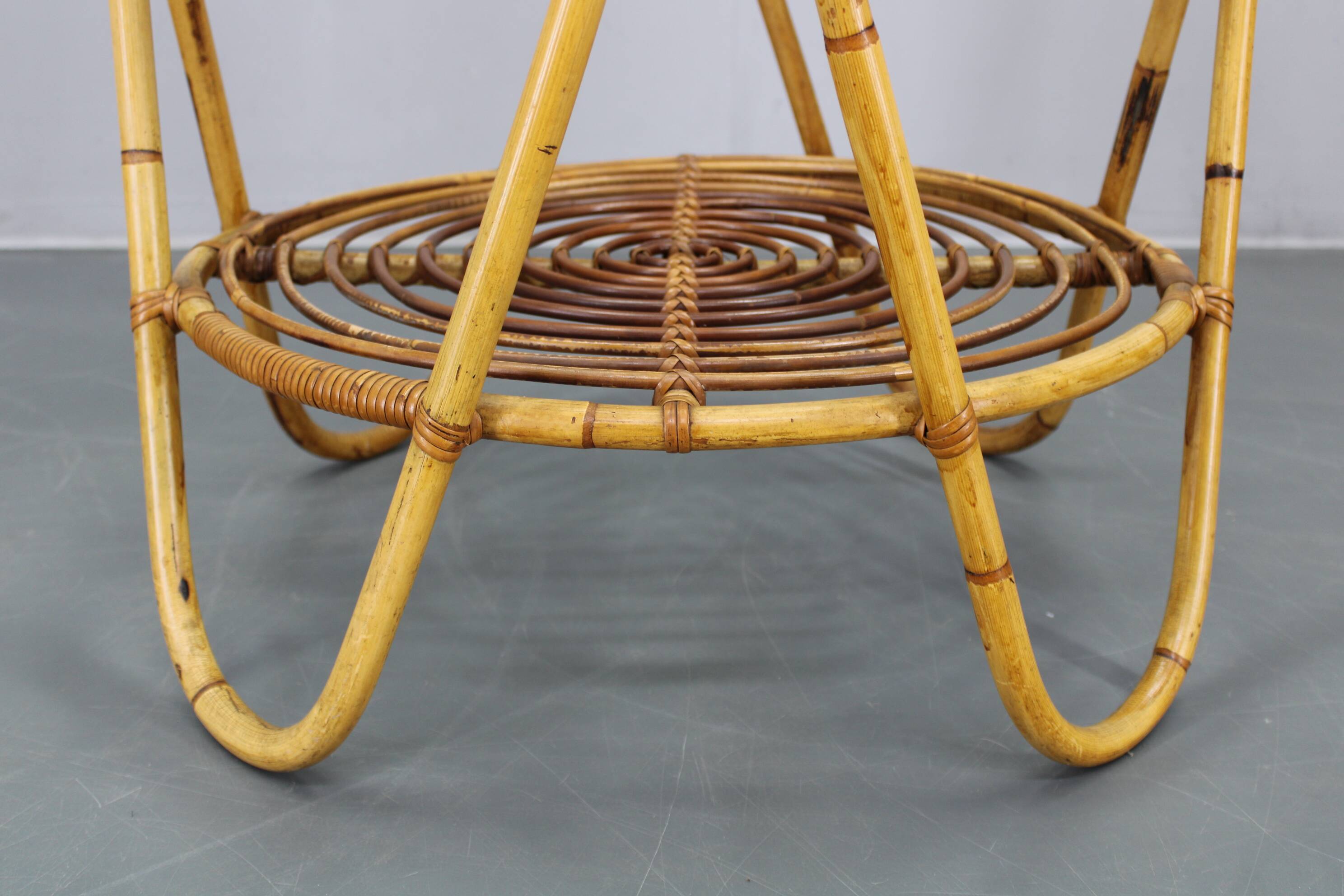 1960s Italian rattan coffee table with glass top, mid-century round design