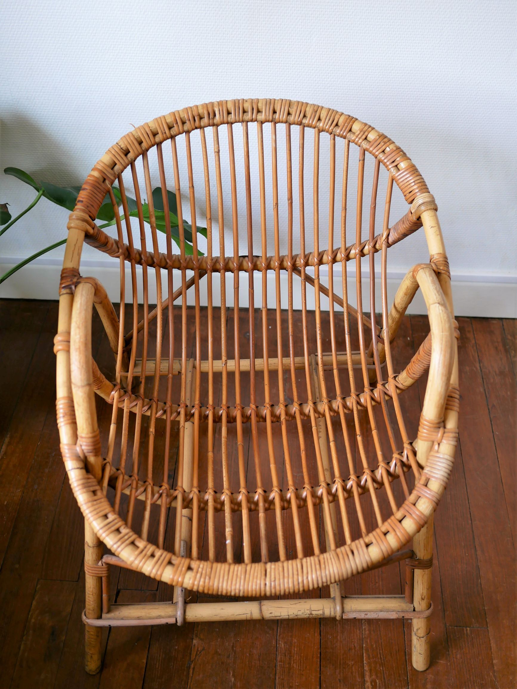 Vintage rattan "shell" armchair