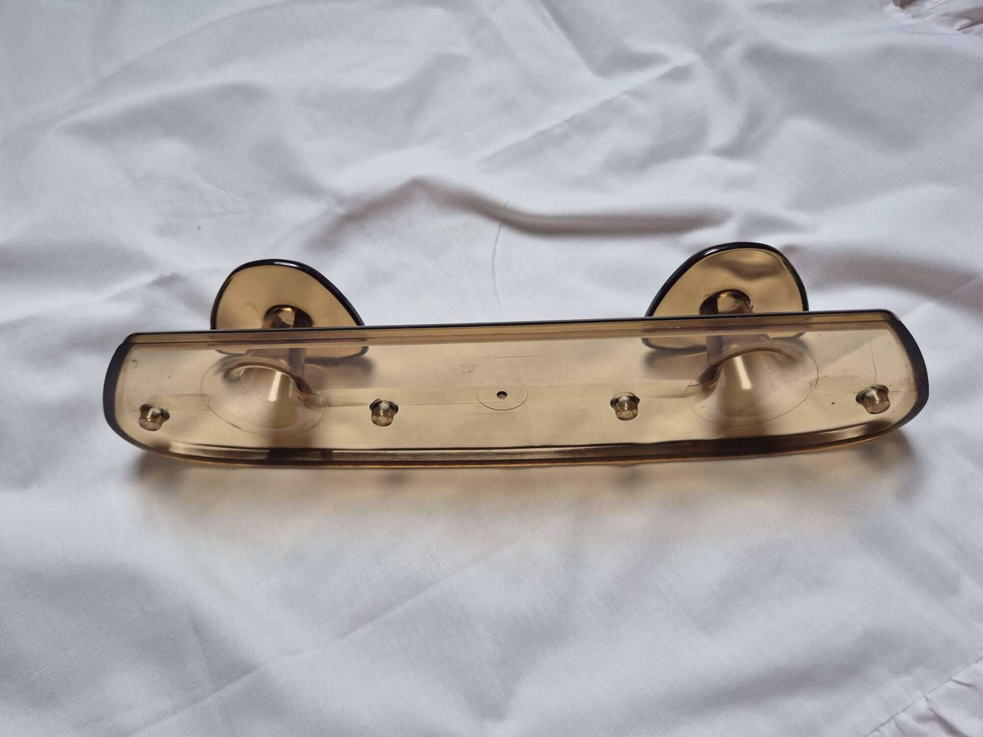 vintage translucent brown coat rack