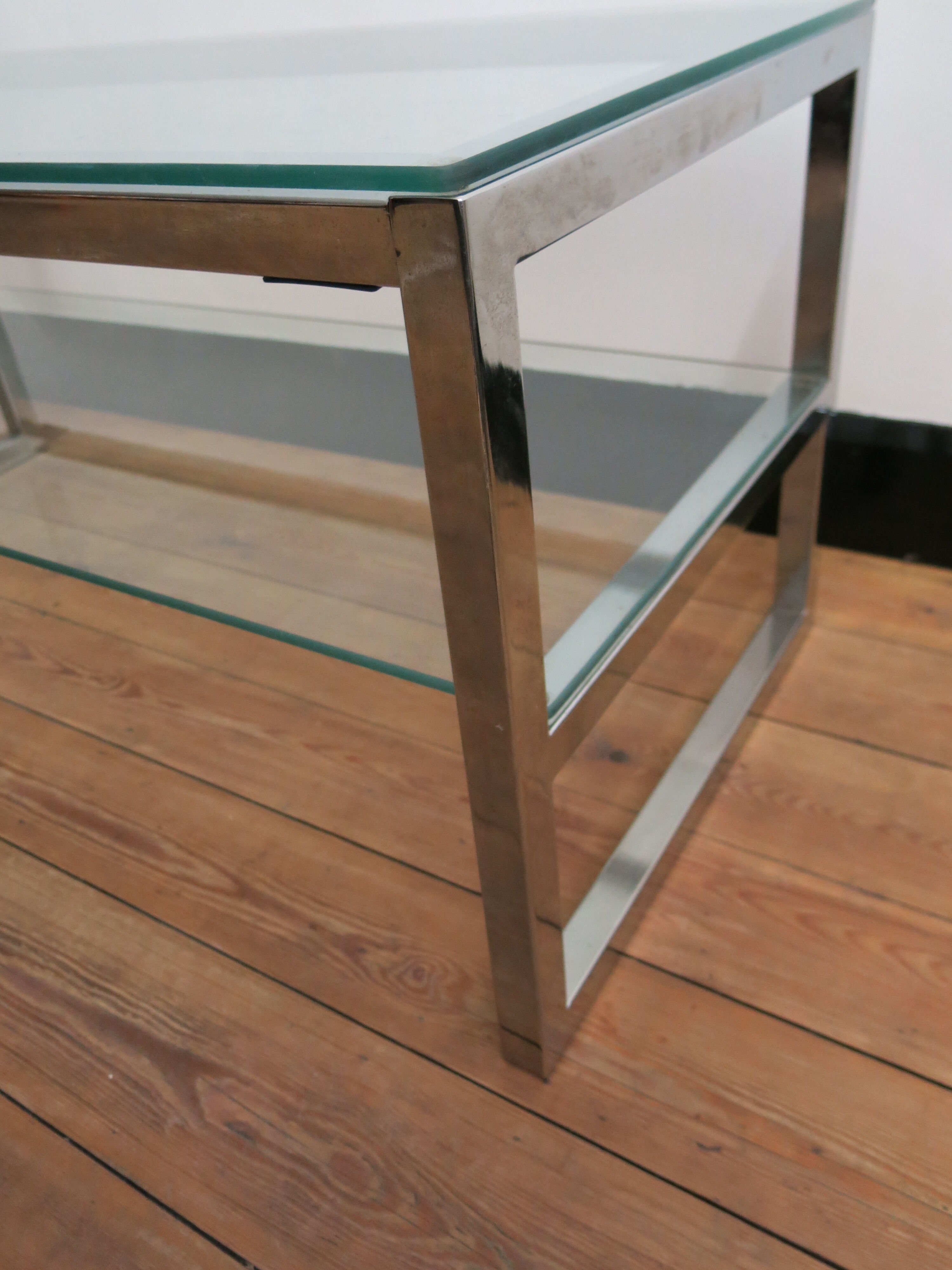 Coffee table in glass and chromed metal