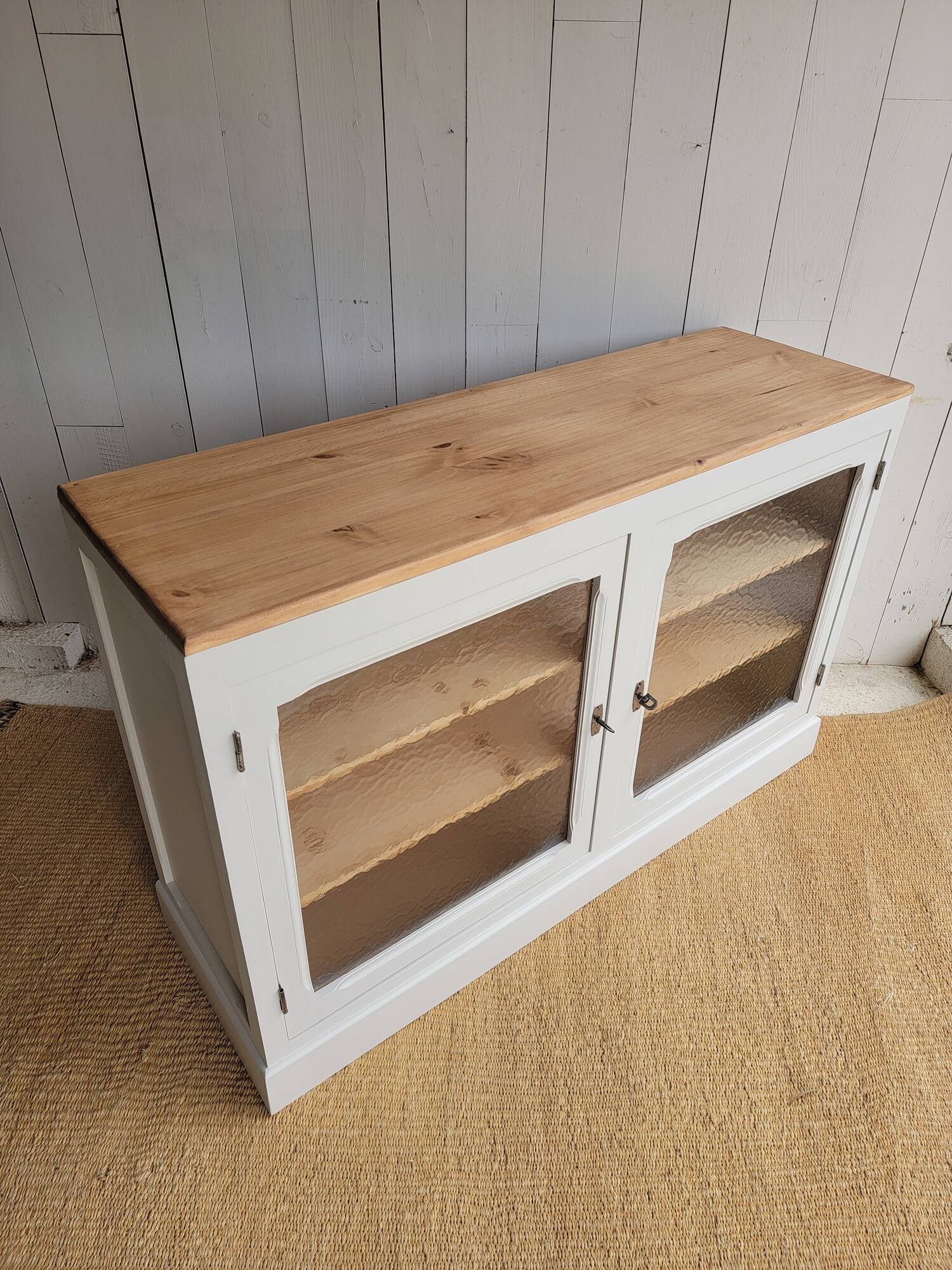Beige glass and wood sideboard