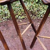 Set of three brutalist tripod stools