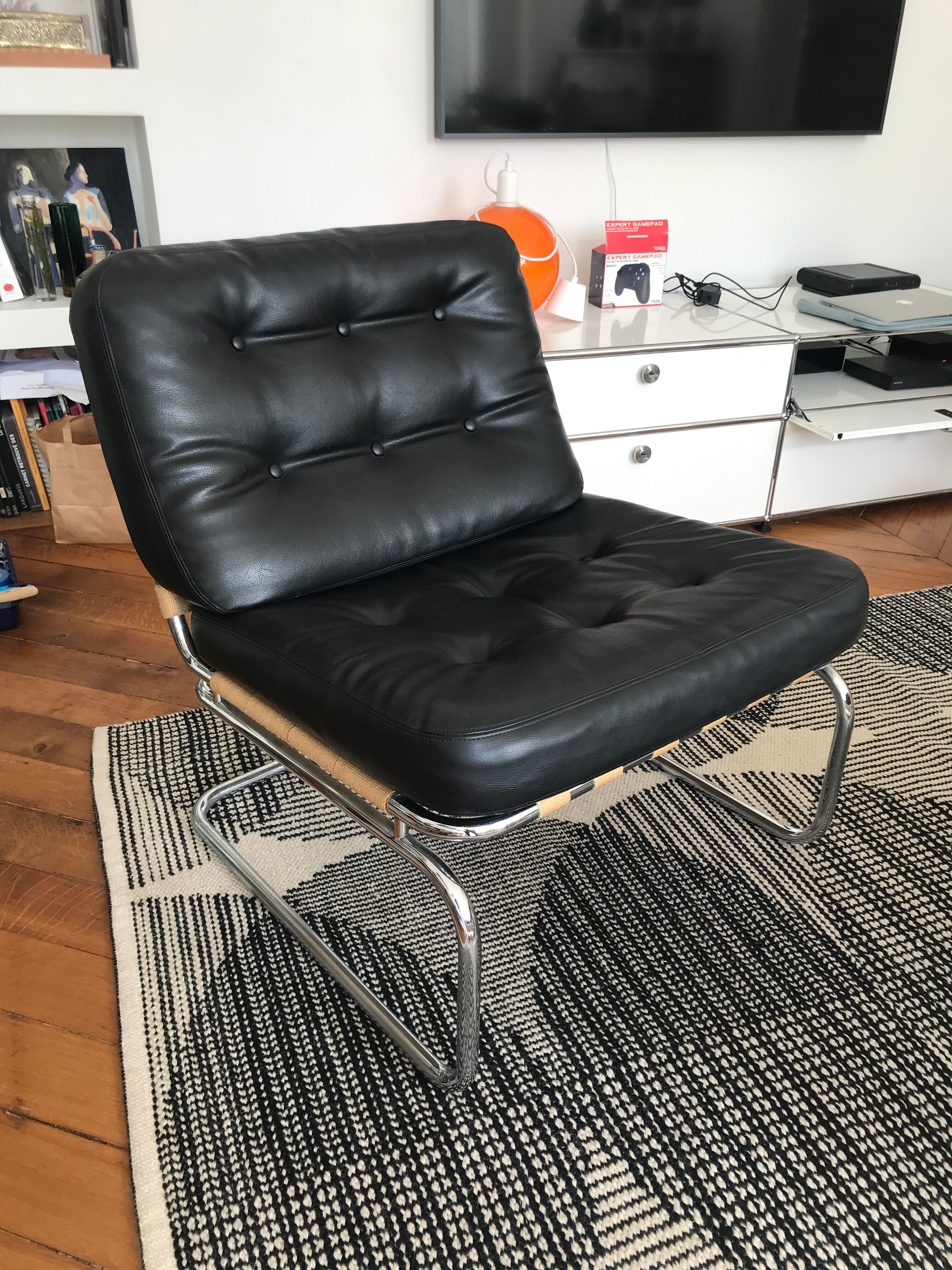 Chrome and leatherette armchair