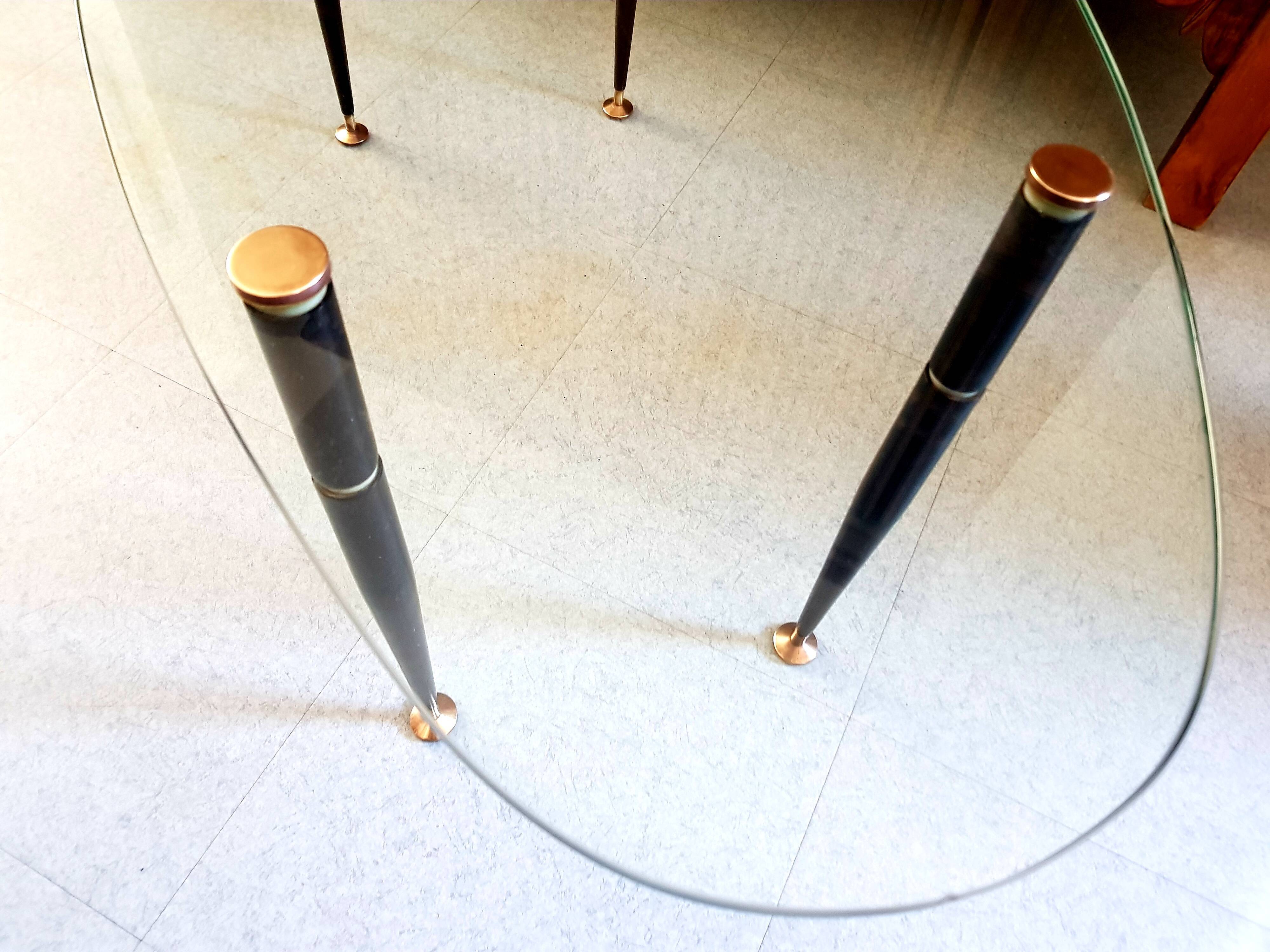 1950 oval coffee table in steel and brass glass