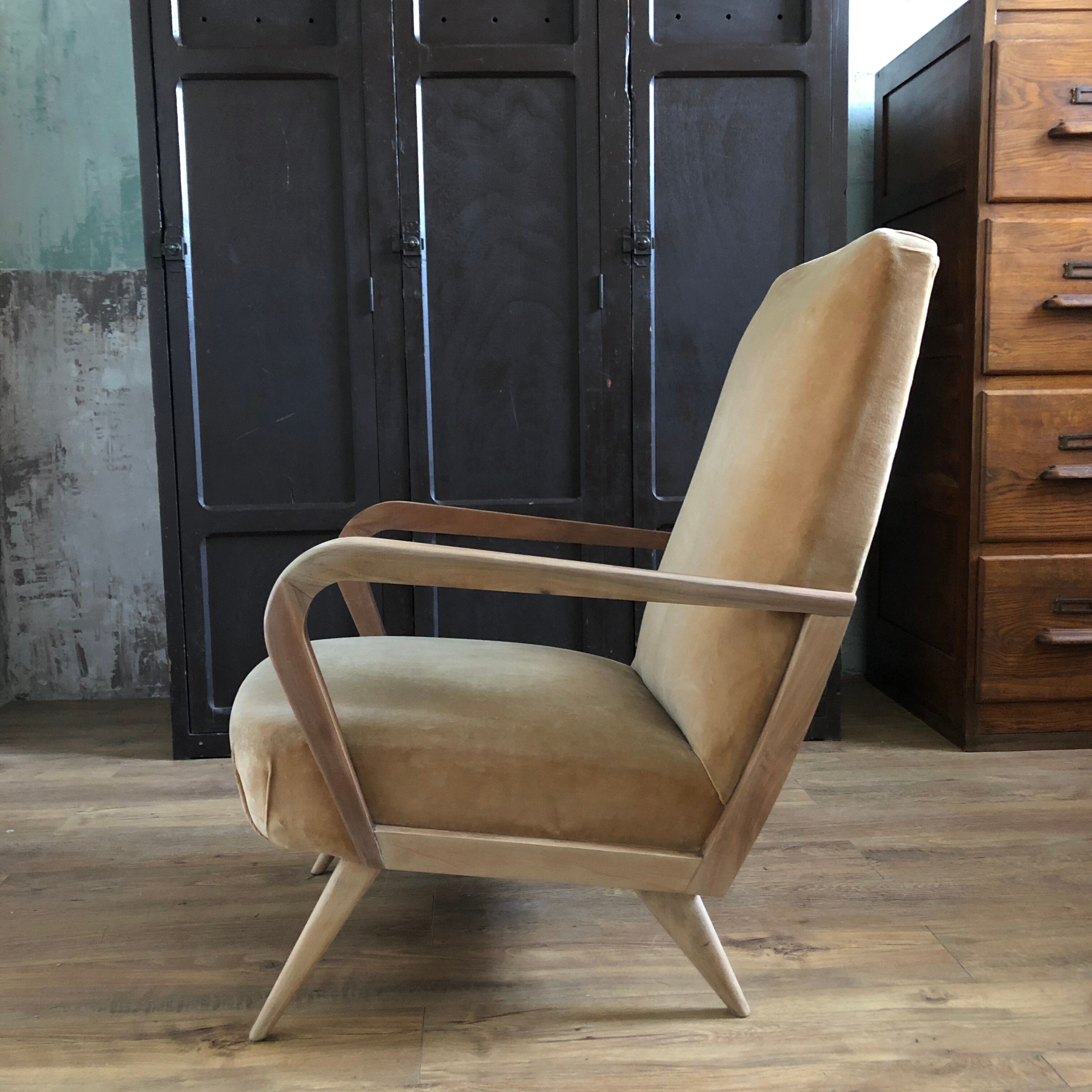 Velvet and wood armchair