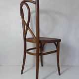 Old curved wooden bistro chair