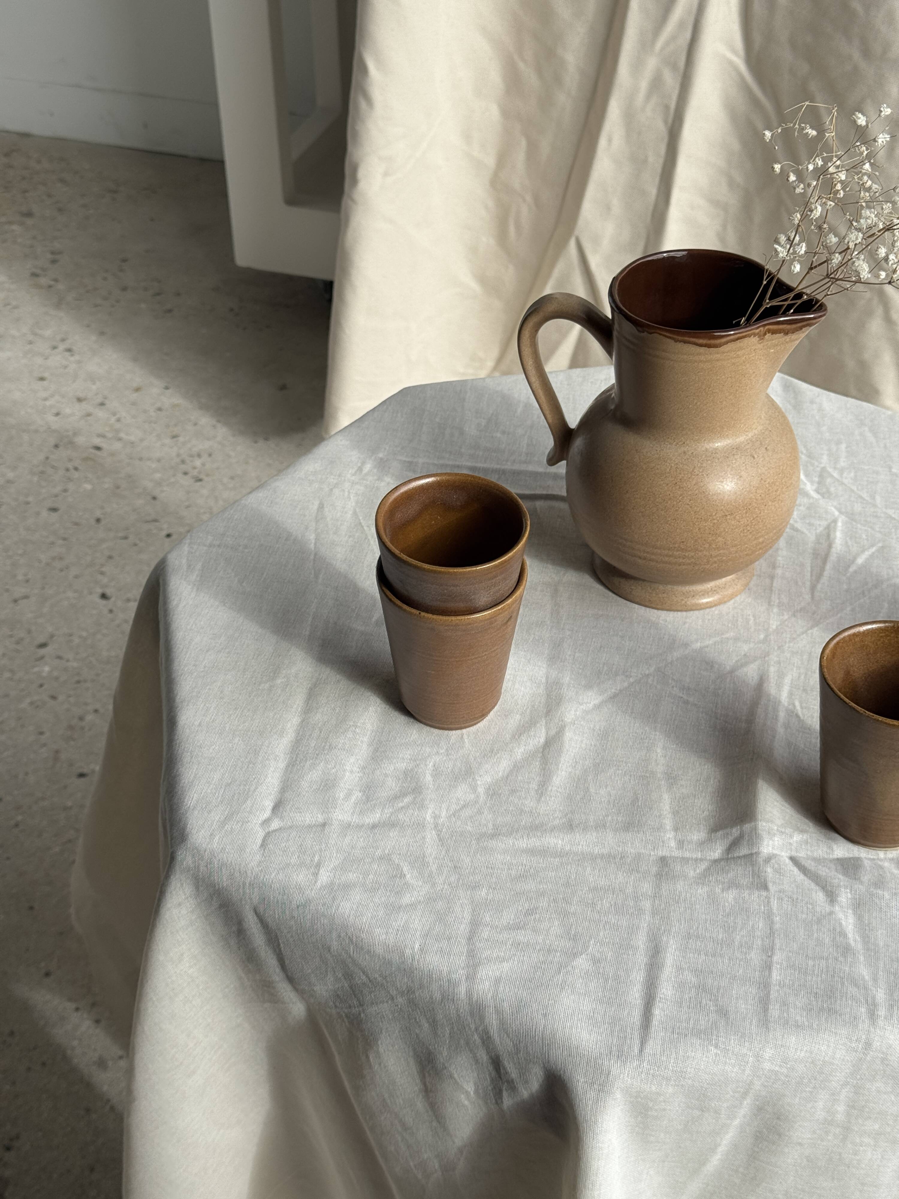 Set of 10 small stoneware mugs from Digoin.