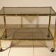 Serving trolley, table on wheels in "bamboo" brass