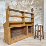 Wooden hardware cabinet painted with wood effect, circa 1940.