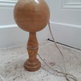 Old bilboquet in blond wood