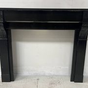 Napoleon III period fireplace with a black marble corbel. 19th century.