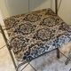 Two antique Manufrance folding chairs in metal and fabric
