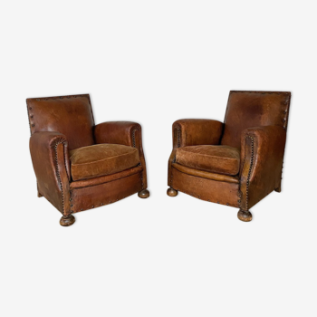 Pair of 1920s leather club chairs