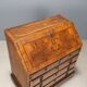Antique walnut burr drop-leaf cabinet with 8 drawers, Italy, 18th century.