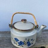 Chinese ceramic and rattan teapot