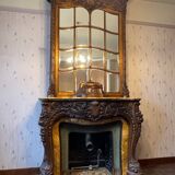 Cheminée en marbre et son trumeau en bois sculpté