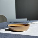 A solid brown flat-bottomed stoneware bowl D18