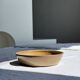 A solid brown flat-bottomed stoneware bowl D18