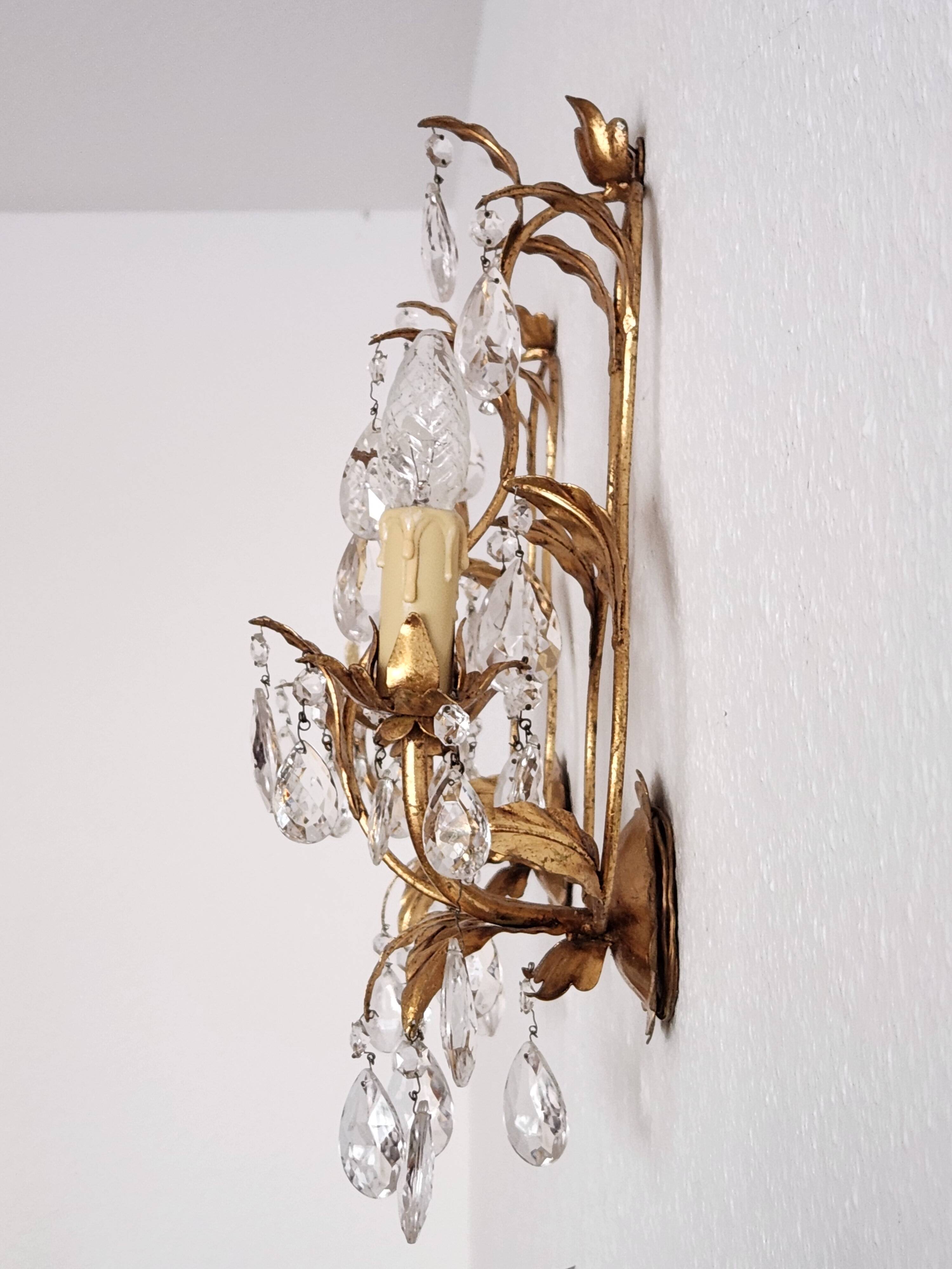 Hand-forged wall lamp gilded with gold leaf and crystals, Italy