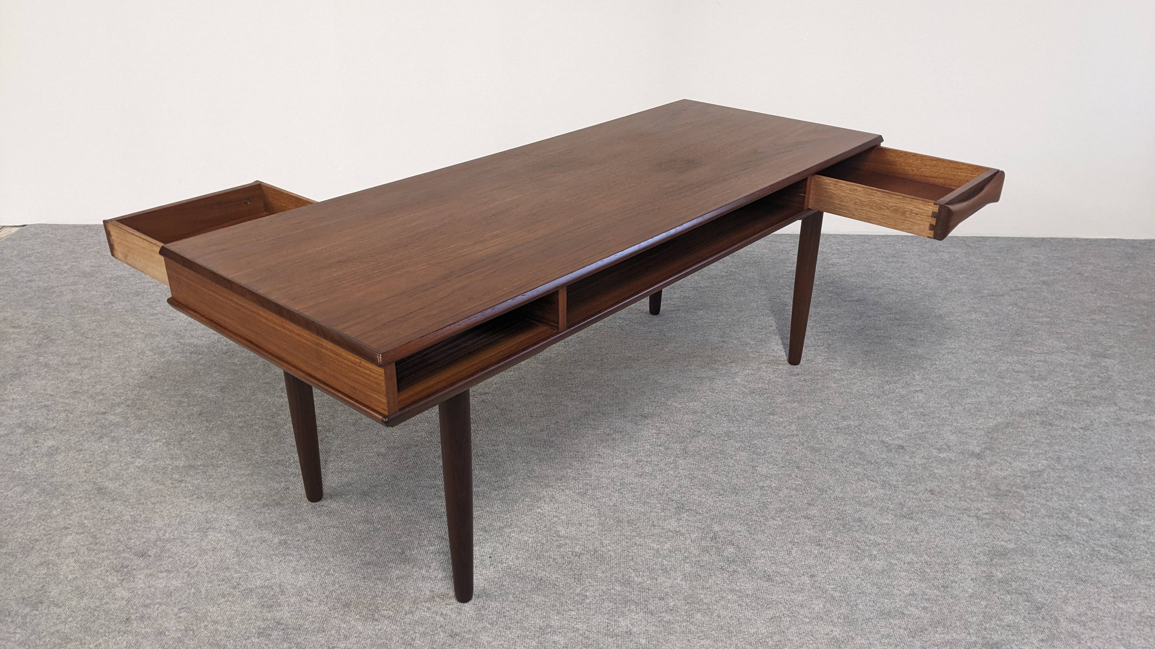 Modernist teak coffee table by Arne Vodder for Dyrlund, Denmark 1960.