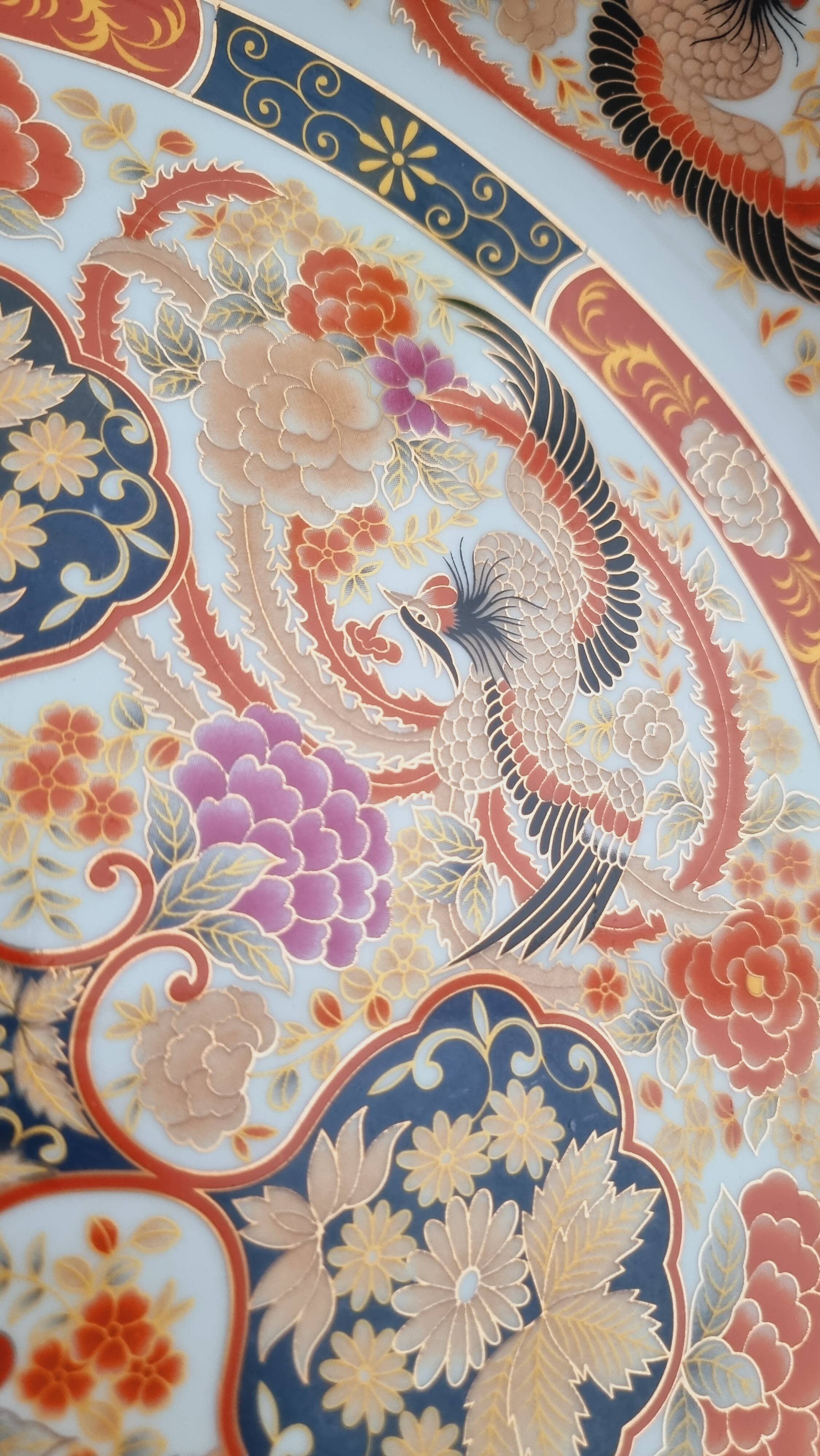 Large deep porcelain plate in Imari style (35.5 cm) with "Phe" decoration.