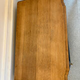 Mat black storage furniture, natural top.