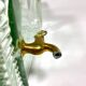 Quadrangular glass fountain and brass tap