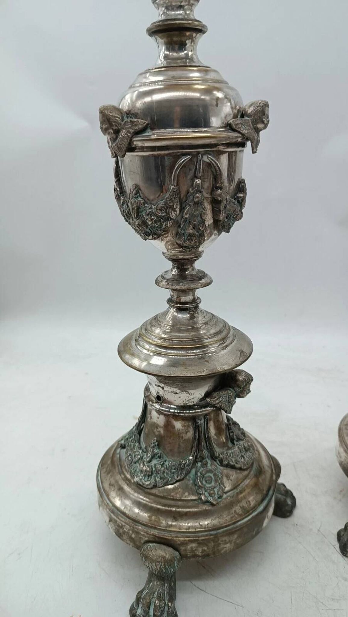 Pair of silver-plated bronze candlesticks in the Empire style, early 19th century, height 70 cm