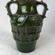 Terracotta jar with dark green handles