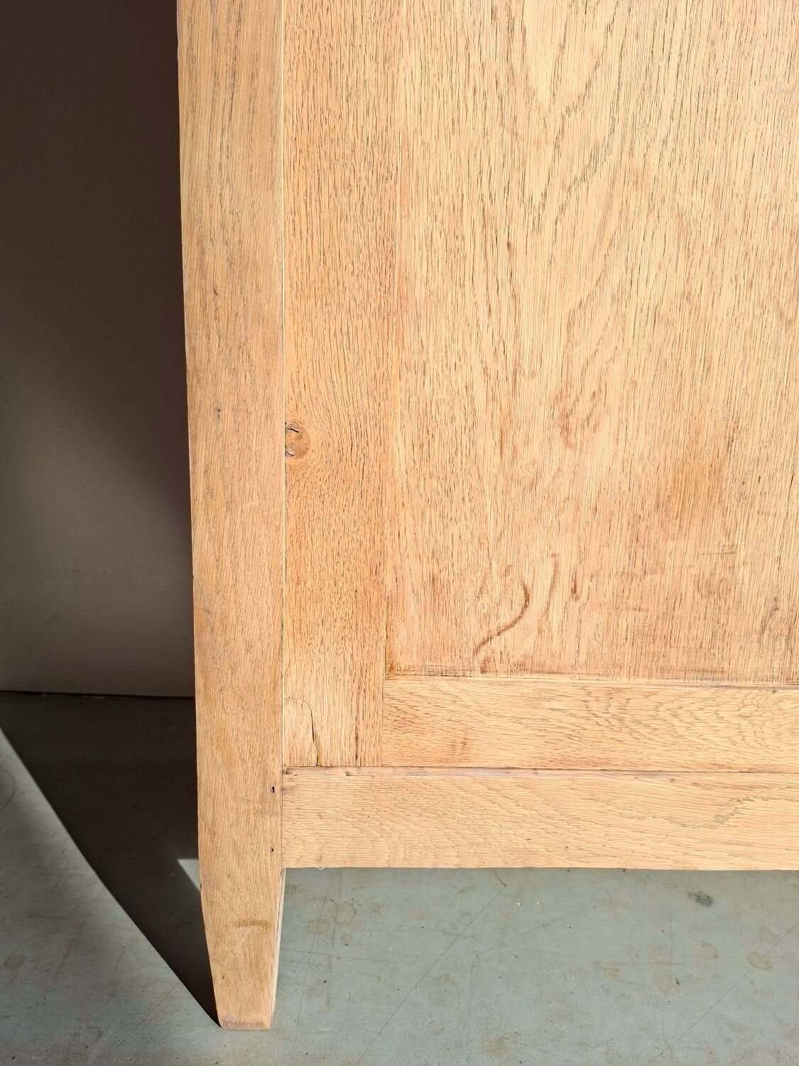 Large antique display cabinet in patinated solid oak.