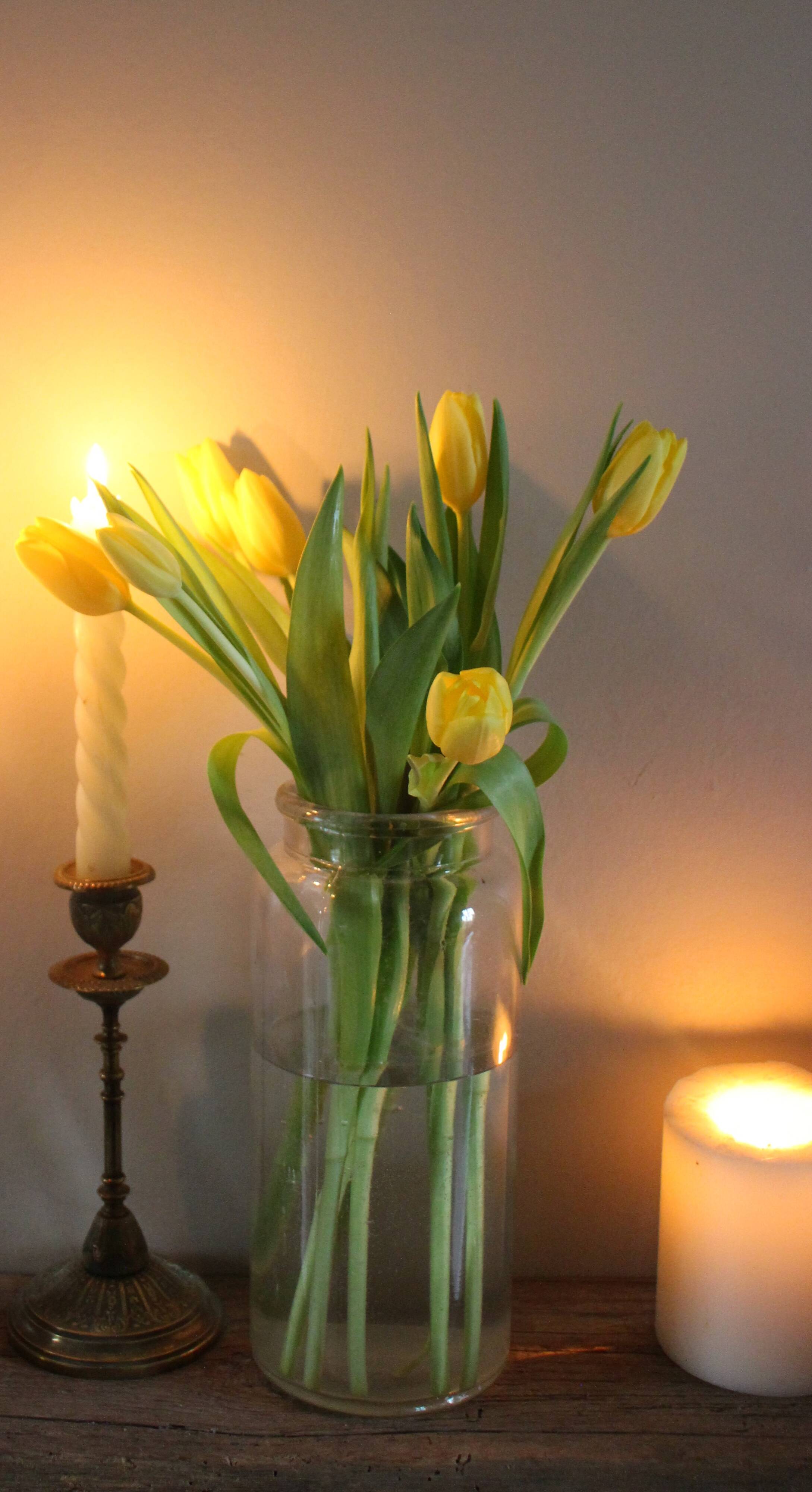 Large antique transparent glass bottle vase