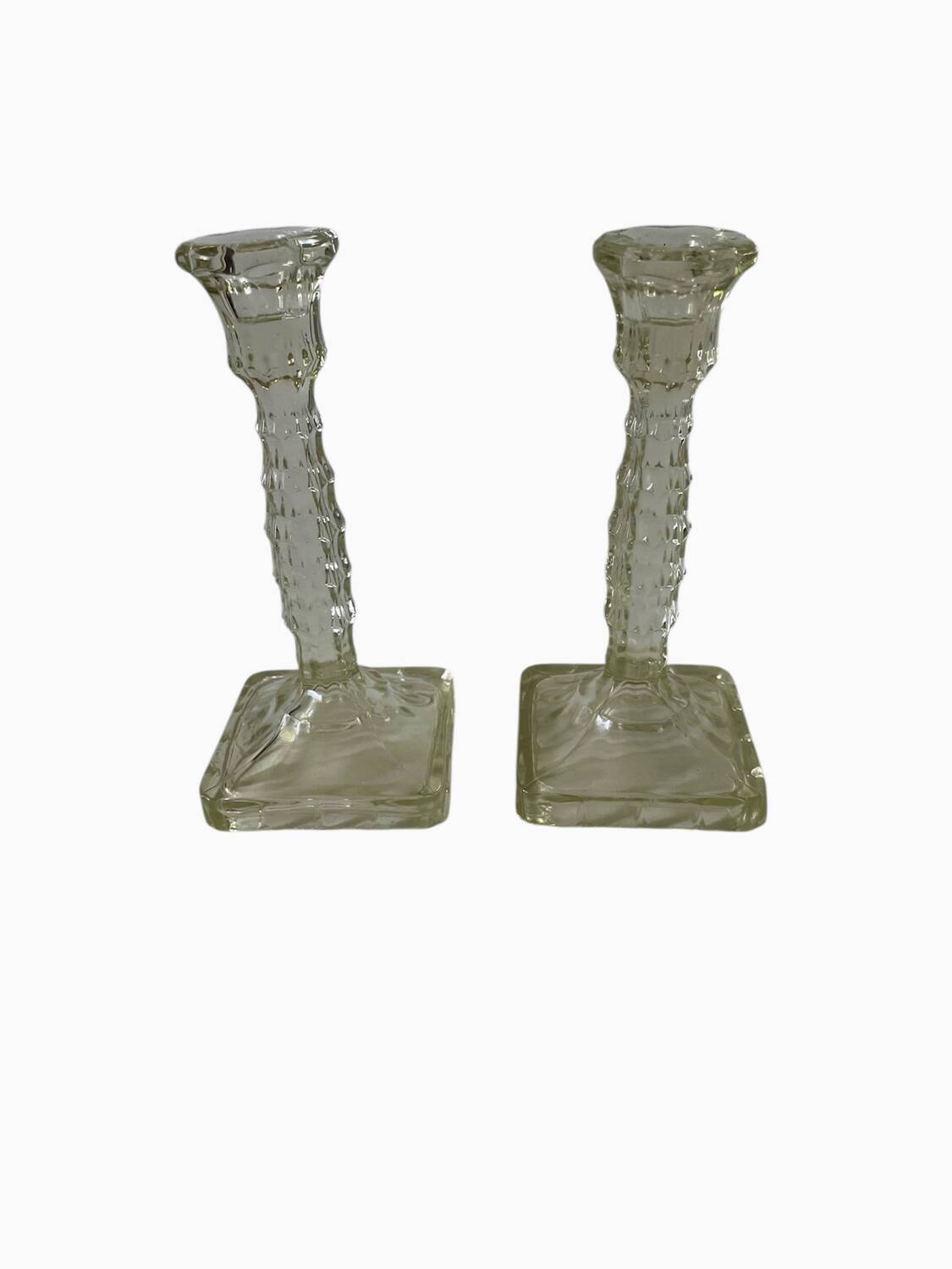 Pair of molded glass candlesticks