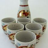 Far Eastern porcelain sake service consisting of a carafon and six cups