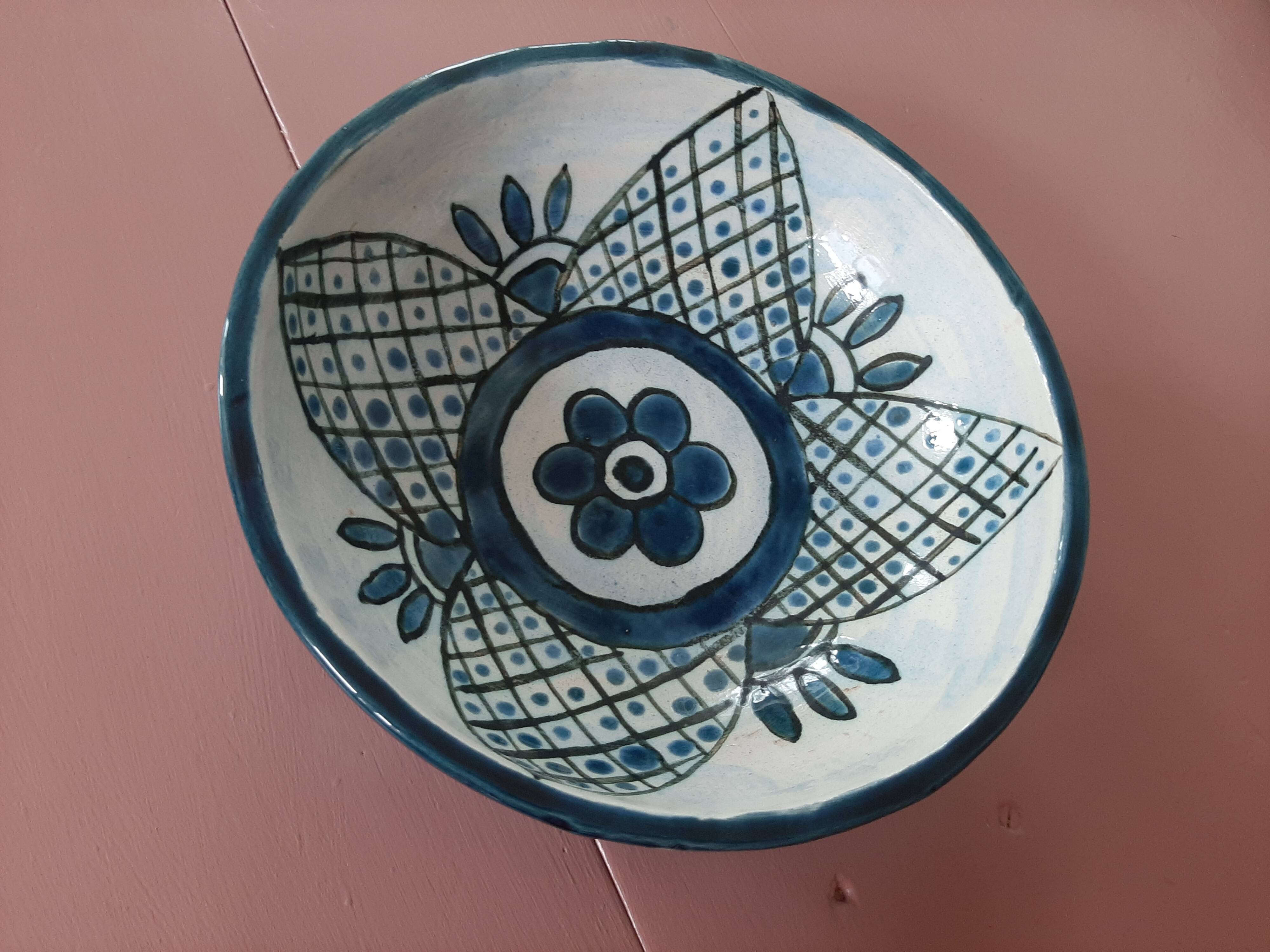 barbotine style salad bowl with blue floral pattern
