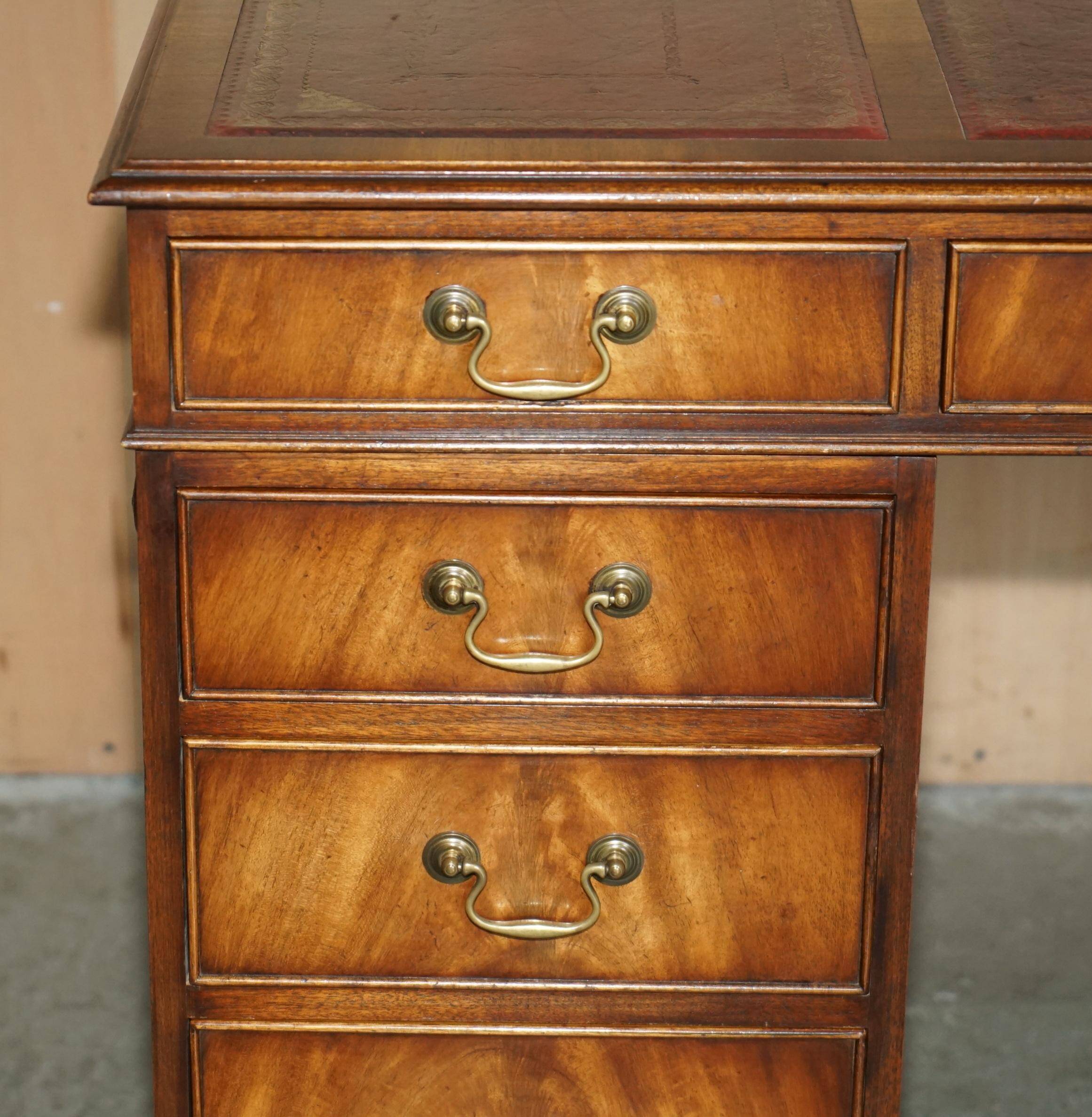 Partner desk Bevan Funnell in hardwood with leather top and gold leaf gilding.