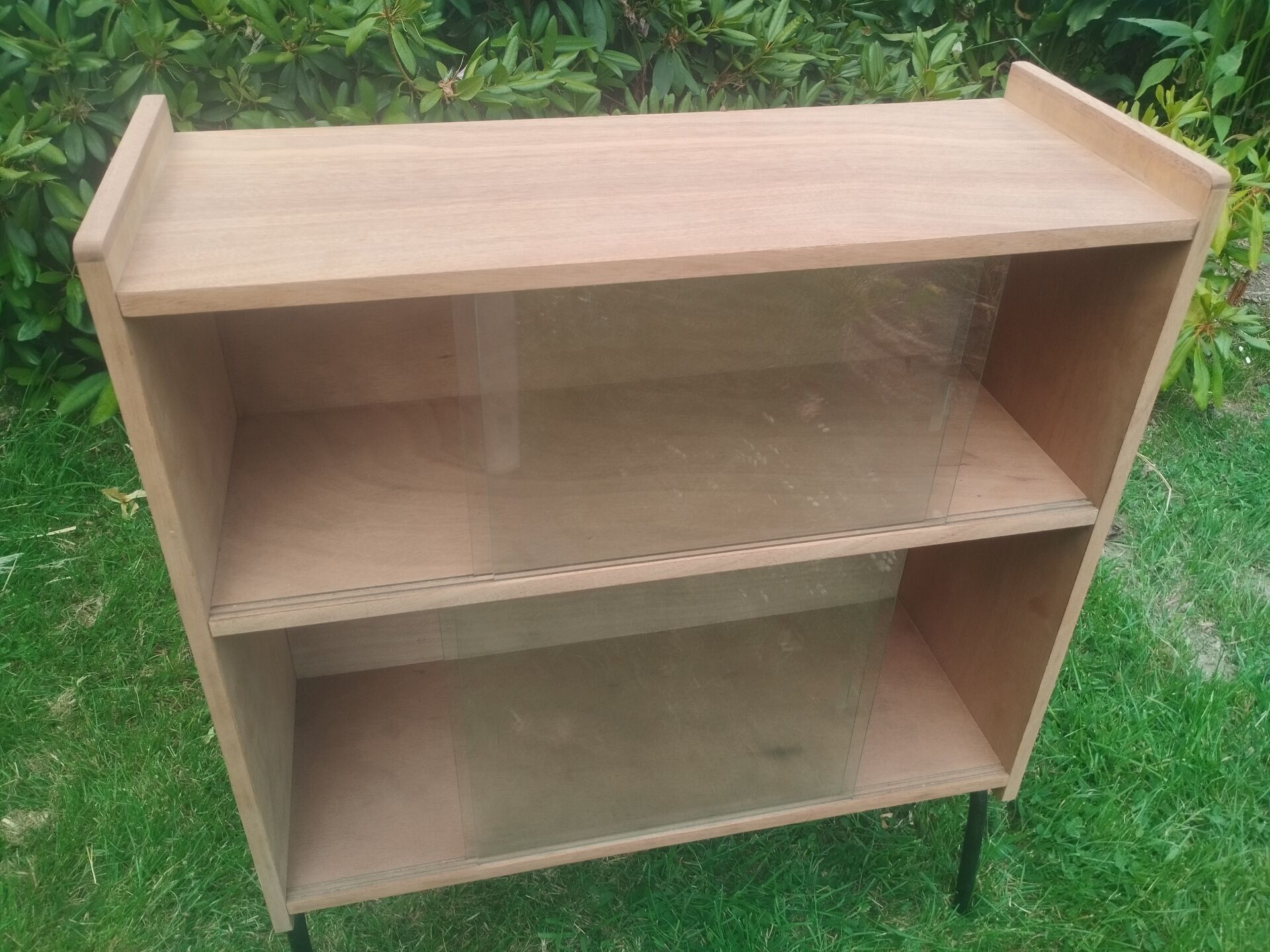Vintage antique display shelf with Scandinavian tapered legs.