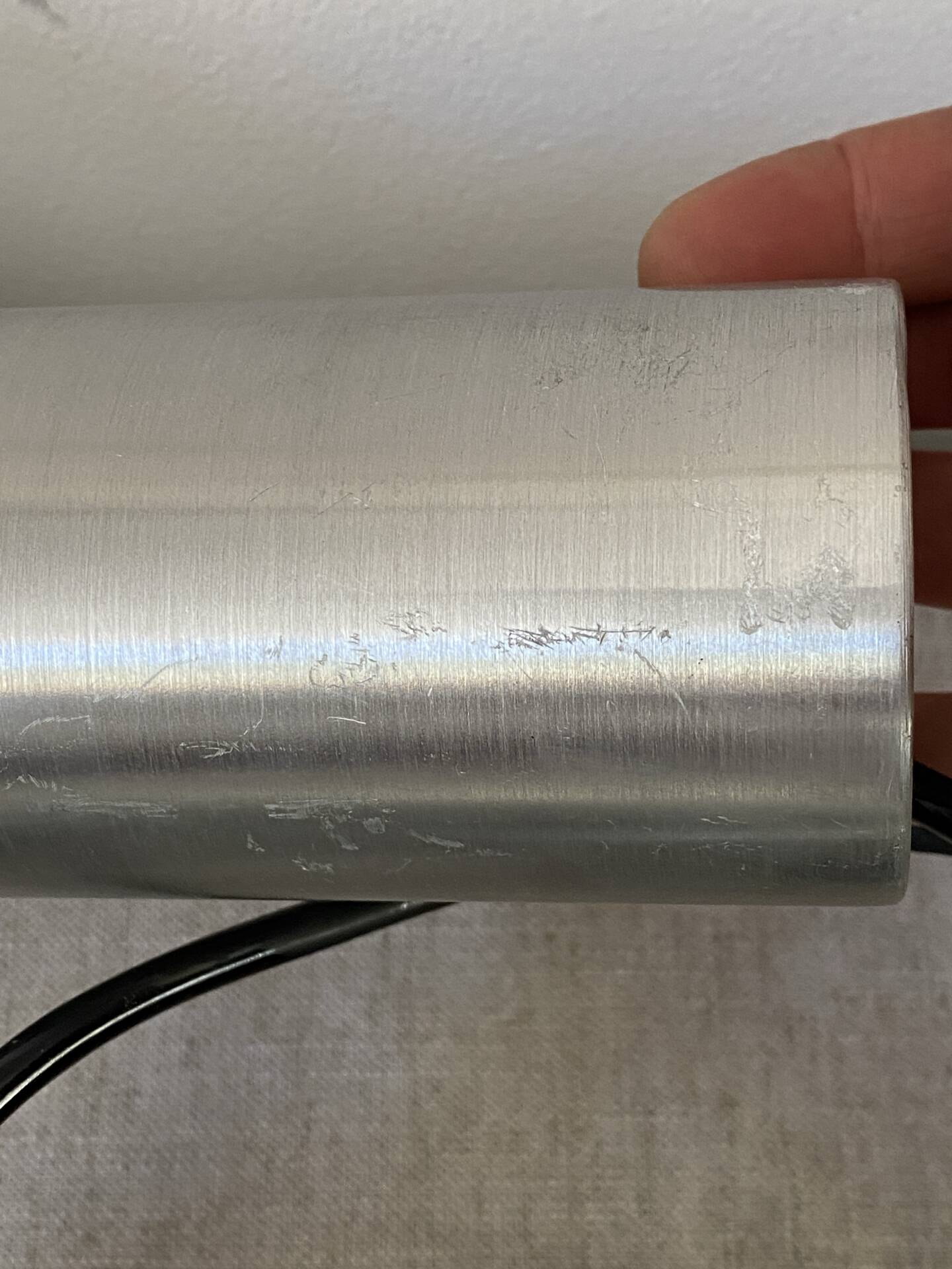Pair of brushed metal wall sconces