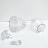 Set of 2 chiseled glass decanters with cap