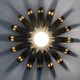 Pair of palm tree wall lights in gold metal. 70s