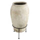 Large terracotta jar on foot