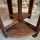 Vintage oak nesting tables set, round coffee table from the 1960s with two integrated side tables.