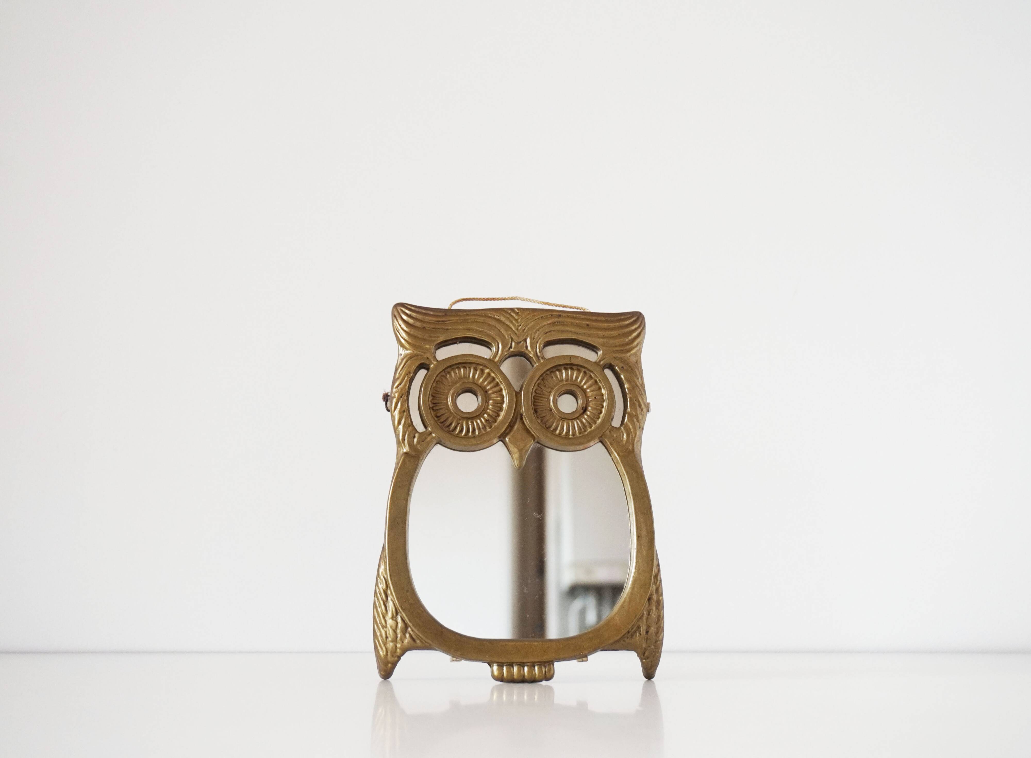 Brass owl mirror
