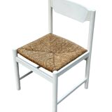Vintage chair with wicker seat, minimalist design