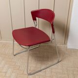 Red plastic-seat stacking chair with chrome frame by Paolo Favaretto for Assisa (Italy 1986) – vintage design