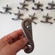Old window handle with a forged iron cremon.