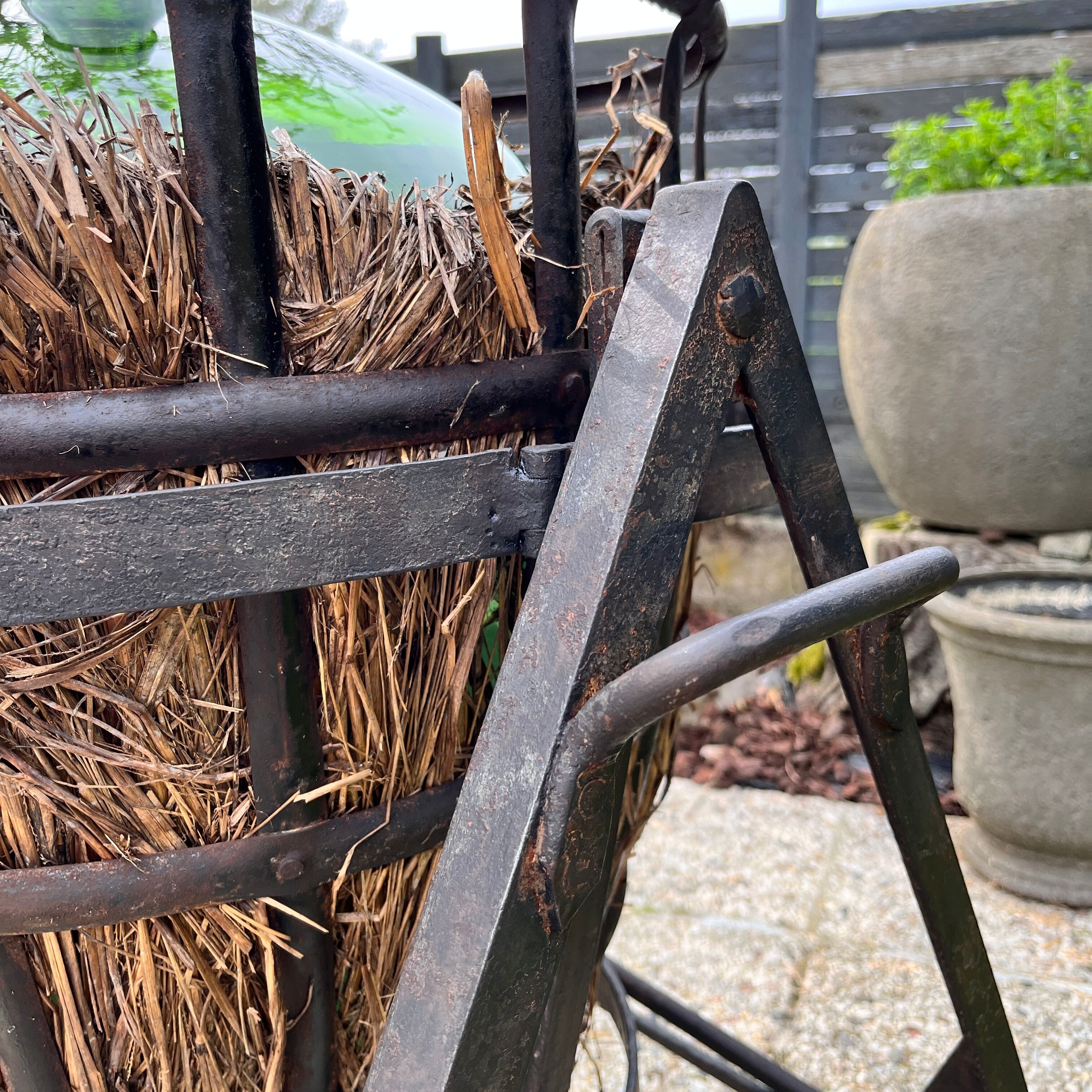 Demijohn on steel rocker